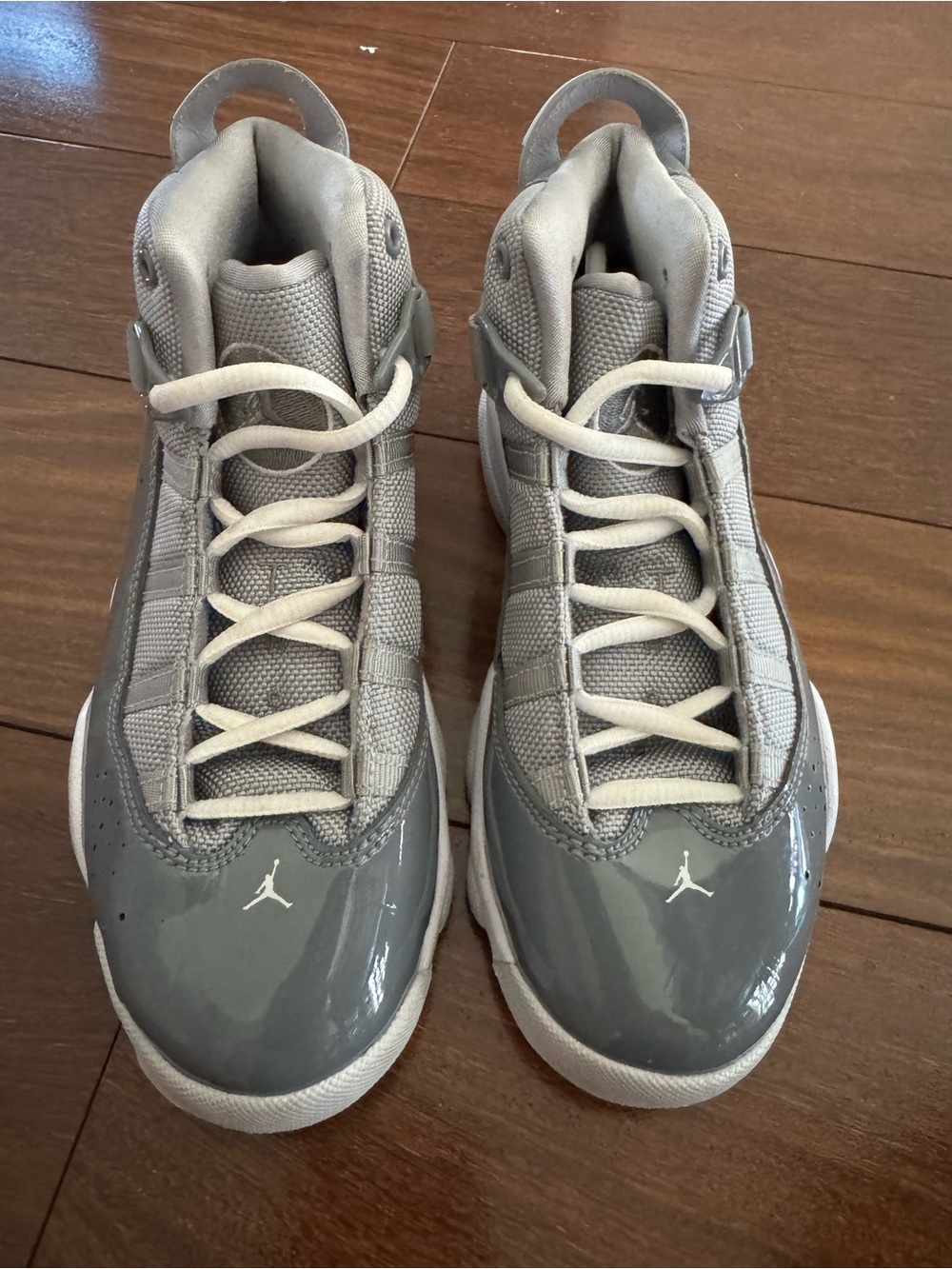 Jordan Grey and White Patent Leather High-Top Sneakers